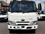 2020 Toyota Dyna Truck Flatbed, 2-ton load capacity, standard 10-foot body, low-floor design, gross vehicle weight less than 5 tons. White Truck for sale, Japanese used car export - photo 6 of 42 | GULJI TRADERS