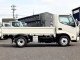 2020 Toyota Dyna Truck Flatbed, 2-ton load capacity, standard 10-foot body, low-floor design, gross vehicle weight less than 5 tons. White Truck for sale, Japanese used car export - photo 8 of 42 | GULJI TRADERS