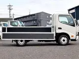 2020 Toyota Dyna Truck Flatbed, 2-ton load capacity, standard 10-foot body, low-floor design, gross vehicle weight less than 5 tons. White Truck for sale, Japanese used car export - photo 10 of 42 | GULJI TRADERS