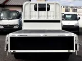 2020 Toyota Dyna Truck Flatbed, 2-ton load capacity, standard 10-foot body, low-floor design, gross vehicle weight less than 5 tons. White Truck for sale, Japanese used car export - photo 11 of 42 | GULJI TRADERS
