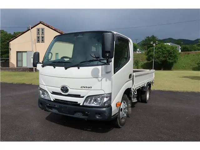 2021 Toyota Dyna Truck 2-ton short ultra-low-floor flatbed - photo 1 2021 Toyota Dyna Truck 2-ton short ultra-low-floor flatbed White Truck for sale, Japanese used car export - photo 1 of 12 | GULJI TRADERS