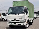 2021 Toyota Dyna Truck Flatbed truck, 1.5t load capacity, covered with canvas, 10 feet, Justlow White Truck for sale, Japanese used car export - photo 1 of 40 | GULJI TRADERS