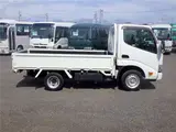 2021 Toyota Dyna Truck Flatbed, standard, low-floor, suitable for regular driver's licenses, with wooden floorboards, navigation system, TV, keyless entry, 1.5t capacity. White Truck for sale, Japanese used car export - photo 4 of 51 | GULJI TRADERS