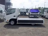 2021 Toyota Dyna Truck Flatbed, standard, low-floor, suitable for regular driver's licenses, with wooden floorboards, navigation system, TV, keyless entry, 1.5t capacity. White Truck for sale, Japanese used car export - photo 7 of 51 | GULJI TRADERS