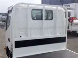 2021 Toyota Dyna Truck Flatbed, standard, low-floor, suitable for regular driver's licenses, with wooden floorboards, navigation system, TV, keyless entry, 1.5t capacity. White Truck for sale, Japanese used car export - photo 9 of 51 | GULJI TRADERS