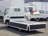 2021 Toyota Dyna Truck Flatbed, standard, low-floor, suitable for regular driver's licenses, with wooden floorboards, navigation system, TV, keyless entry, 1.5t capacity. White Truck for sale, Japanese used car export - photo 36 of 51 | GULJI TRADERS