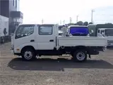2021 Toyota Dyna Truck Double cab, 4WD, flatbed, 6-seater, semi-long, semi-wide, high floor, 2t White Truck for sale, Japanese used car export - photo 3 of 51 | GULJI TRADERS