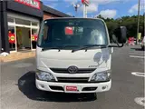 2021 Toyota Dyna Truck 1-ton capacity, flatbed, vertical gate, low-floor, MT5 White Painted Truck for sale, Japanese used car export - photo 2 of 76 | GULJI TRADERS