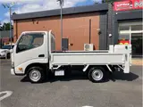 2021 Toyota Dyna Truck 1-ton capacity, flatbed, vertical gate, low-floor, MT5 White Painted Truck for sale, Japanese used car export - photo 8 of 76 | GULJI TRADERS