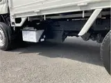 2021 Toyota Dyna Truck 1-ton capacity, flatbed, vertical gate, low-floor, MT5 White Painted Truck for sale, Japanese used car export - photo 47 of 76 | GULJI TRADERS