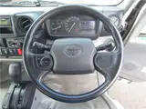 2021 Toyota Dyna Truck 2t, automatic transmission, full low-profile suspension, LED lights, PCS (Pre-Collision System), rearview mirror with backup camera. White Truck for sale, Japanese used car export - photo 15 of 26 | GULJI TRADERS
