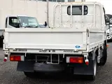 2021 Toyota Dyna Truck Flatbed truck, 2-ton load capacity, standard 10-foot body, Justlow, gross vehicle weight less than 5 tons. White Truck for sale, Japanese used car export - photo 2 of 6 | GULJI TRADERS