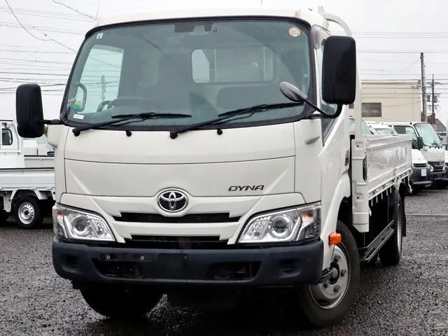 2021 Toyota Dyna Truck Flatbed, 3-ton load capacity, standard, high cab, long. White Truck for sale, Japanese used car export - photo 1 of 6 | GULJI TRADERS