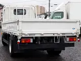 2021 Toyota Dyna Truck Flatbed, 3-ton load capacity, standard, high cab, long. White Truck for sale, Japanese used car export - photo 4 of 6 | GULJI TRADERS
