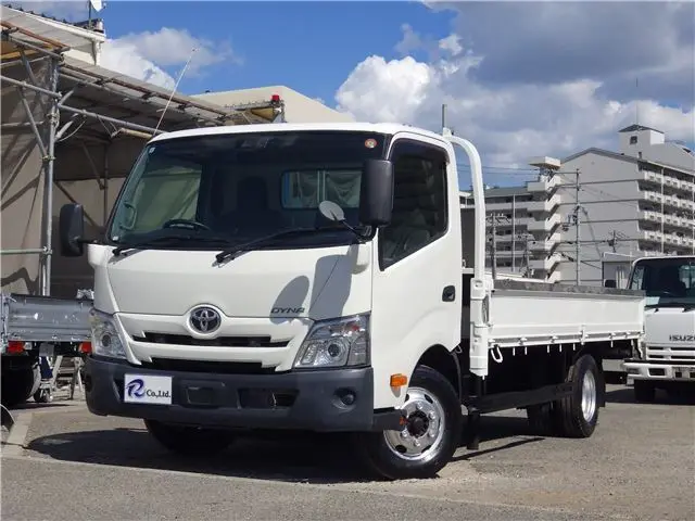 2021 Toyota Dyna Truck Flatbed, 3-ton, long, wide, manual transmission, diesel. - photo 1 2021 Toyota Dyna Truck Flatbed, 3-ton, long, wide, manual transmission, diesel. White Truck for sale, Japanese used car export - photo 1 of 43 | GULJI TRADERS