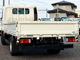 2021 Toyota Dyna Truck Flatbed, 2-ton load capacity, wide long, low-floor, gross vehicle weight less than 5 tons White Truck for sale, Japanese used car export - photo 4 of 6 | GULJI TRADERS