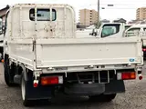 2021 Toyota Dyna Truck Flatbed truck, 2-ton load capacity, standard 10-foot body, Justlow, gross vehicle weight less than 5 tons. White Truck for sale, Japanese used car export - photo 2 of 6 | GULJI TRADERS