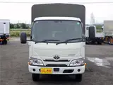 2022 Toyota Dyna Truck Flatbed truck with canvas cover, standard long, just low, cargo bed floorboard, collision mitigation, 2-ton capacity. White Truck for sale, Japanese used car export - photo 2 of 51 | GULJI TRADERS