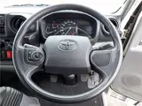 2022 Toyota Dyna Truck Flatbed truck with canvas cover, standard long, just low, cargo bed floorboard, collision mitigation, 2-ton capacity. White Truck for sale, Japanese used car export - photo 12 of 51 | GULJI TRADERS