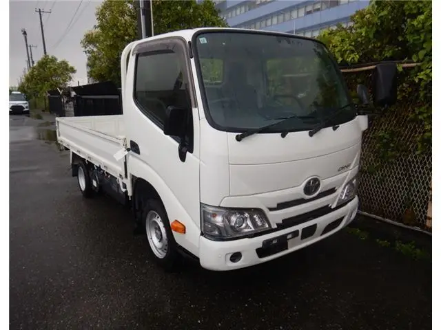 2022 Toyota Dyna Truck Flatbed ☆ Pre-collision safety - photo 1 2022 Toyota Dyna Truck Flatbed ☆ Pre-collision safety White Truck for sale, Japanese used car export - photo 1 of 9 | GULJI TRADERS
