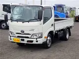 2022 Toyota Dyna Truck 4WD Standard 10-foot Flatbed 2-ton Low-floor Collision Mitigation Brake 5-speed Manual Transmission White Truck for sale, Japanese used car export - photo 1 of 51 | GULJI TRADERS