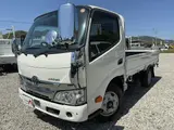 2022 Toyota Dyna Truck Tokushima Prefecture, 2-ton capacity, flatbed truck, 10-foot length, under 5 tons, 6-speed manual transmission. White Truck for sale, Japanese used car export - photo 1 of 60 | GULJI TRADERS