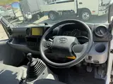 2022 Toyota Dyna Truck Tokushima Prefecture, 2-ton capacity, flatbed truck, 10-foot length, under 5 tons, 6-speed manual transmission. White Truck for sale, Japanese used car export - photo 32 of 60 | GULJI TRADERS