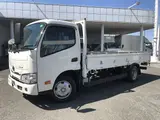 2022 Toyota Dyna Truck Gifu Prefecture, steel plate bed, standard long body, 6-speed manual transmission, flatbed, 2-ton capacity. White Truck for sale, Japanese used car export - photo 1 of 52 | GULJI TRADERS