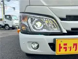 2022 Toyota Dyna Truck 1.5-ton low-floor 10-foot flatbed truck with reduced braking system, keyless entry, and automatic transmission. White Truck for sale, Japanese used car export - photo 27 of 45 | GULJI TRADERS