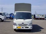 2022 Toyota Dyna Truck Flatbed truck with canvas cover, wide extra-long, 2-ton capacity, 5m cargo bed, collision mitigation system, 6-speed manual transmission. White Truck for sale, Japanese used car export - photo 2 of 51 | GULJI TRADERS