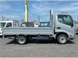 2022 Toyota Dyna Truck 1.25-ton 10-foot low-bed flatbed truck with reduced braking system, 5-speed manual transmission, standard driver's license acceptable. Silver Truck for sale, Japanese used car export - photo 4 of 43 | GULJI TRADERS