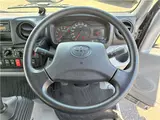 2022 Toyota Dyna Truck 1.25-ton 10-foot low-bed flatbed truck with reduced braking system, 5-speed manual transmission, standard driver's license acceptable. Silver Truck for sale, Japanese used car export - photo 16 of 43 | GULJI TRADERS