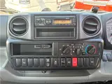 2022 Toyota Dyna Truck 1.25-ton 10-foot low-bed flatbed truck with reduced braking system, 5-speed manual transmission, standard driver's license acceptable. Silver Truck for sale, Japanese used car export - photo 18 of 43 | GULJI TRADERS