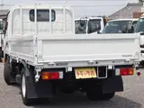 2022 Toyota Dyna Truck Flatbed truck, 2-ton load capacity, standard 10-foot chassis, fully equipped, gross vehicle weight less than 5 tons. White Truck for sale, Japanese used car export - photo 5 of 41 | GULJI TRADERS