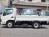 2022 Toyota Dyna Truck Flatbed truck, 2-ton load capacity, standard 10-foot chassis, fully equipped, gross vehicle weight less than 5 tons. White Truck for sale, Japanese used car export - photo 9 of 41 | GULJI TRADERS
