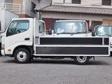 2022 Toyota Dyna Truck Flatbed truck, 2-ton load capacity, standard 10-foot chassis, fully equipped, gross vehicle weight less than 5 tons. White Truck for sale, Japanese used car export - photo 11 of 41 | GULJI TRADERS