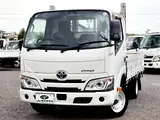 2022 Toyota Dyna Truck Flatbed truck, 1250kg load capacity, automatic transmission only &amp; standard driver's license compatible, gross vehicle weight less than 3.5t. White Truck for sale, Japanese used car export - photo 1 of 38 | GULJI TRADERS