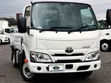 2022 Toyota Dyna Truck Flatbed, 2-ton load capacity, standard 10-foot body, low-floor design, gross vehicle weight less than 5 tons. White Truck for sale, Japanese used car export - photo 4 of 41 | GULJI TRADERS