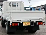 2022 Toyota Dyna Truck Flatbed, 2-ton load capacity, standard 10-foot body, low-floor design, gross vehicle weight less than 5 tons. White Truck for sale, Japanese used car export - photo 5 of 41 | GULJI TRADERS
