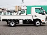 2022 Toyota Dyna Truck Flatbed, 2-ton load capacity, standard 10-foot body, low-floor design, gross vehicle weight less than 5 tons. White Truck for sale, Japanese used car export - photo 8 of 41 | GULJI TRADERS