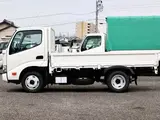 2022 Toyota Dyna Truck Flatbed, 2-ton load capacity, standard 10-foot body, low-floor design, gross vehicle weight less than 5 tons. White Truck for sale, Japanese used car export - photo 9 of 41 | GULJI TRADERS