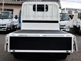 2022 Toyota Dyna Truck Flatbed, 2-ton load capacity, standard 10-foot body, low-floor design, gross vehicle weight less than 5 tons. White Truck for sale, Japanese used car export - photo 11 of 41 | GULJI TRADERS