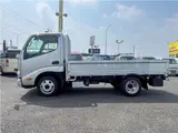 2022 Toyota Dyna Truck 1.4-ton 10-foot flatbed 4WD, 1GD diesel turbo, 5-speed manual transmission. Silver Truck for sale, Japanese used car export - photo 3 of 40 | GULJI TRADERS
