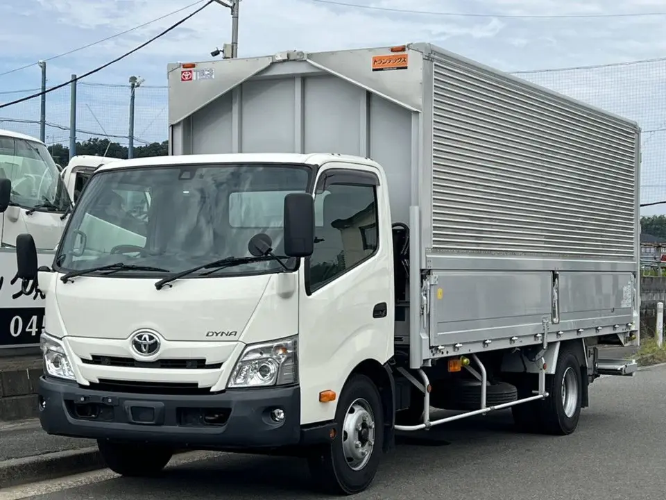 2022 Toyota Dyna Truck Standard wing body, with power tailgate, 2WD. - photo 1 2022 Toyota Dyna Truck Standard wing body, with power tailgate, 2WD. White Truck for sale, Japanese used car export - photo 1 of 25 | GULJI TRADERS