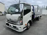 2023 Toyota Dyna Truck Car carrier, full flat, tire securing. White Truck for sale, Japanese used car export - photo 1 of 5 | GULJI TRADERS