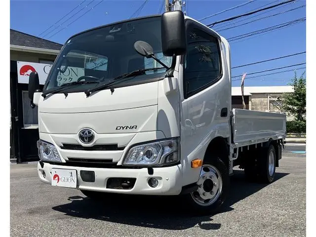 2023 Toyota Dyna Truck 4WD, 1.4t load capacity, long, flatbed, dual tires, 10 feet White Truck for sale, Japanese used car export - photo 1 of 47 | GULJI TRADERS