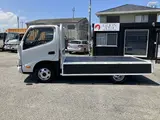 2023 Toyota Dyna Truck 4WD, 1.4t load capacity, long, flatbed, dual tires, 10 feet White Truck for sale, Japanese used car export - photo 11 of 47 | GULJI TRADERS