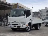 2023 Toyota Dyna Truck Flatbed, 4WD, 1.4t, 10ft, fully low-floor, manual transmission, diesel. White Truck for sale, Japanese used car export - photo 1 of 43 | GULJI TRADERS