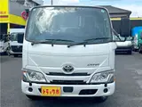 2025 Toyota Dyna Truck 1.4-ton 10-foot flatbed 4WD truck with reduced braking system and 5-speed manual transmission. White Truck for sale, Japanese used car export - photo 2 of 42 | GULJI TRADERS