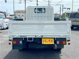 2025 Toyota Dyna Truck 1.4-ton 10-foot flatbed 4WD truck with reduced braking system and 5-speed manual transmission. White Truck for sale, Japanese used car export - photo 5 of 42 | GULJI TRADERS